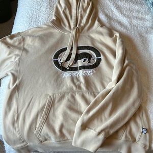 Ecko hoodie, tan/beige, logo is a dark forest green. Size is XXL.